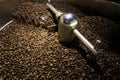 Coffee bean in roasting machine during cool down process for coffee shop and relating industry