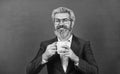 Dark coffee, bright future. Happy teacher hold coffee cup. Bearded man enjoy drinking coffee. Coffee break. School break