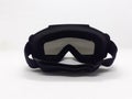 Dark Colored Plastic Modern Goggles for Eye Protection in Motorbike Sport and Paintball Games in White Isolated Background