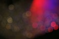 Dark colorful bokeh with red light for nightlife concept. Royalty Free Stock Photo