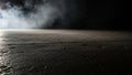 Dark concrete floor with cracks and wisps of smoke illuminated by dramatic light Royalty Free Stock Photo