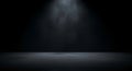 Dark concrete stage illuminated by a single spotlight Royalty Free Stock Photo