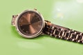 A dark copper toned watch. Royalty Free Stock Photo