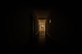 Dark corridor with cabinet doors and lights with silhouette of spooky horror man standing with different poses. Royalty Free Stock Photo