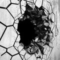 Dark cracked broken hole in concrete wall. Grunge background Royalty Free Stock Photo