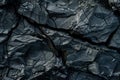 Dark and cracked natural stone surface forming abstract pattern Royalty Free Stock Photo