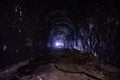 Dark creepy abandoned coal mine in backlight Royalty Free Stock Photo