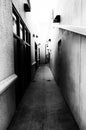 Dark creepy alley in black and white