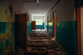 Dark creepy corridor with doors and broken floor in old scary abandoned building, tunnel view Royalty Free Stock Photo