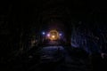 Dark creepy old abandoned mine in backlight Royalty Free Stock Photo