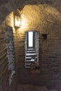 Dark crypt with rectangular window