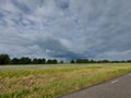 Dark cumulus clouds over the farmland of the Krimpenerwaard