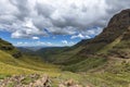 Dark cumulus clouds over the lower part of Sani Pass Royalty Free Stock Photo