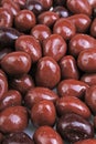 Dark and dairy chocolate balls. Chocolate drops as background texture pattern. Bon bons. Royalty Free Stock Photo