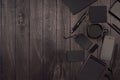 Dark deluxe black blank stationery, mockup scene with phone, coffee on black wooden plank, blank objects for placing your design. Royalty Free Stock Photo