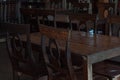 Dark dining table with wooden chair and vintage restaurant