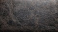 Dark distressed leather surface close-up. Royalty Free Stock Photo