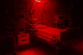 Dark dramatic red colors. fear and anxiety hospital emergency room intensive care. modern equipment, concept of healthy medicine, Royalty Free Stock Photo