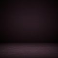 A dark, empty background with subtle highlights creating a soft gradient effect. The Royalty Free Stock Photo