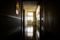 Dark and empty corridor with available natural light from window Royalty Free Stock Photo