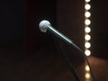 Dark empty stage with microphone. 3d render Royalty Free Stock Photo