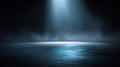 Dark empty studio background with soft blue spotlight, subtle fog, and cinematic gradient lighting. Royalty Free Stock Photo