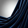 Dark fabric with soft folds and ripples is illuminated by diffused light, creating a play Royalty Free Stock Photo