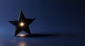 A dark five-pointed marble star glows intensely Royalty Free Stock Photo
