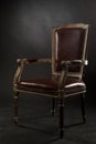 Dark genuine leather vintage chair