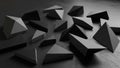 Dark geometric objects are scattered across a textured black Royalty Free Stock Photo