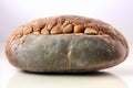 Dark German bread with rough crust showcased against white background. Simple presentation highlights artisanal baking Royalty Free Stock Photo