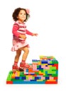 Dark girl climbing on toy ladder