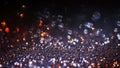 Dark glitter magic background. Defocused light and free focused place for your design.