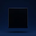A dark, glossy black cube is centrally positioned against a deep blue background. The Royalty Free Stock Photo