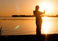 Silhouette of slim woman dancing traditional tribal belly dance Royalty Free Stock Photo