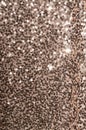 Dark gold sequins fabric pattern texture. Fashion abstract background Royalty Free Stock Photo