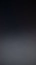 Dark Gray and Black Smooth Gradient Background with Subtle Light Transition Creating a Minimalist and Backdrop Royalty Free Stock Photo