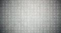 Dark gray fabric texture with subtle blue glowing digital grid pattern. Royalty Free Stock Photo