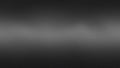 A dark gray gradient background with a subtle grainy texture and a soft light beam effect creating a mysterious and abstract Royalty Free Stock Photo