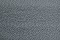 Dark gray leather texture closeup, useful as background Royalty Free Stock Photo