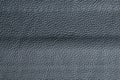 Dark gray leather texture closeup, useful as background Royalty Free Stock Photo