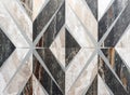 Dark gray porcelain tile with a rhomboid ornament. Background and texture of porcelain stoneware