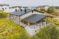 dark gray roof of an industrial building made of metal. Corrugat