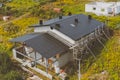 dark gray roof of an industrial building made of metal. Corrugat