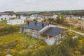 dark gray roof of an industrial building made of metal. Corrugat