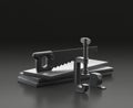 Dark gray small clamp, handsaw and table measure with hardboard blocks on black background, single color workshop tool, 3d