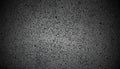 Dark gray speckled textured background with vignetting Royalty Free Stock Photo