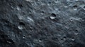 Rugged dark gray extraterrestrial surface pockmarked with irregular craters, revealing harsh astronomical landscape Royalty Free Stock Photo