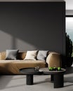 Dark gray wall mockup in stylish interior with brown sofa and coffee table, 3d rendering Royalty Free Stock Photo