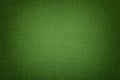 Dark green background from a textile material with wicker pattern, closeup Royalty Free Stock Photo